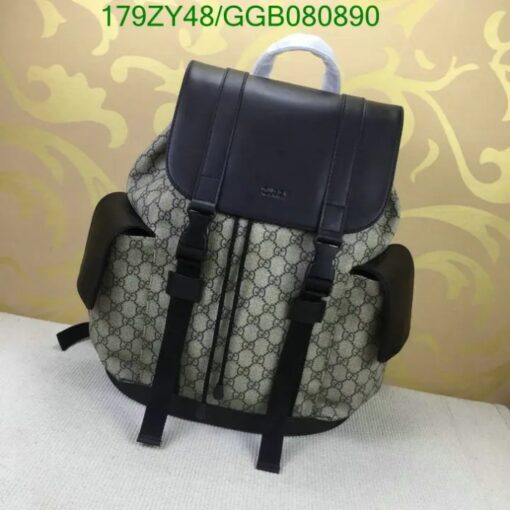 Stylish grey Gucci GG Supreme Canvas Backpack with silver-tone hardware