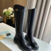 Dior Tory Burch knee-high boots in napa cowhide