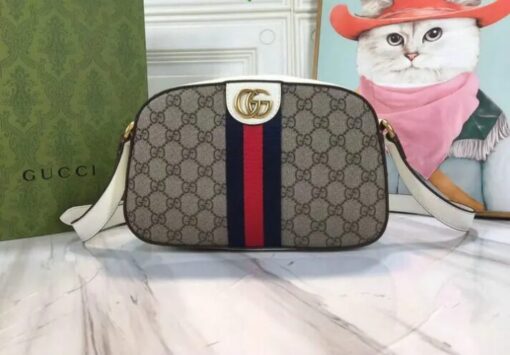 Gucci Small Ophidia GG Shoulder Bag YB65935 featuring gold hardware and white leather trim.