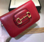 Gucci Red Horsebit 1955 Shoulder Bag with genuine cowhide leather and iconic gold metal